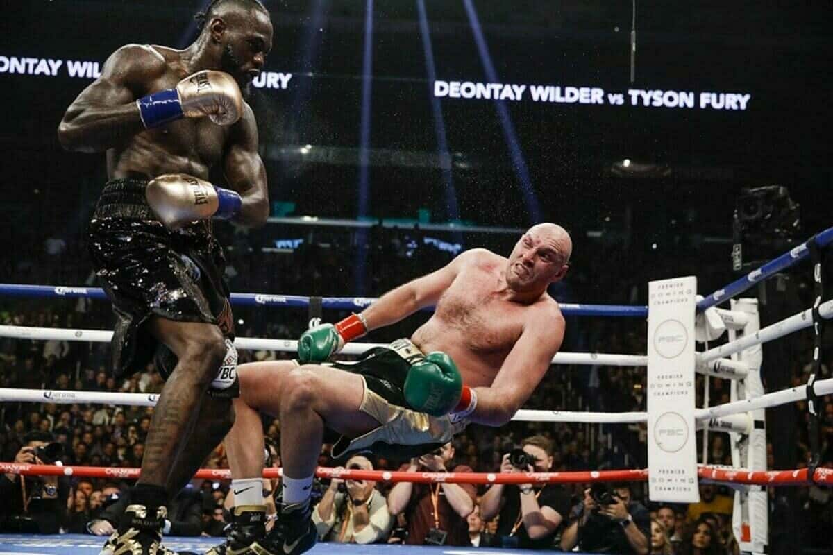 Deontay Wilder knocks down Tyson Fury