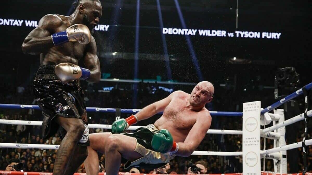 Deontay Wilder knocks down Tyson Fury