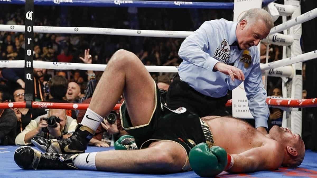 Tyson Fury dropped by Deontay Wilder with Jack Reiss over him