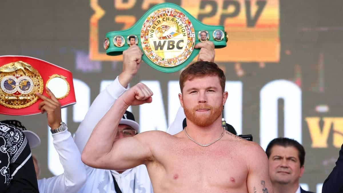 Canelo with WBC and IBF belts