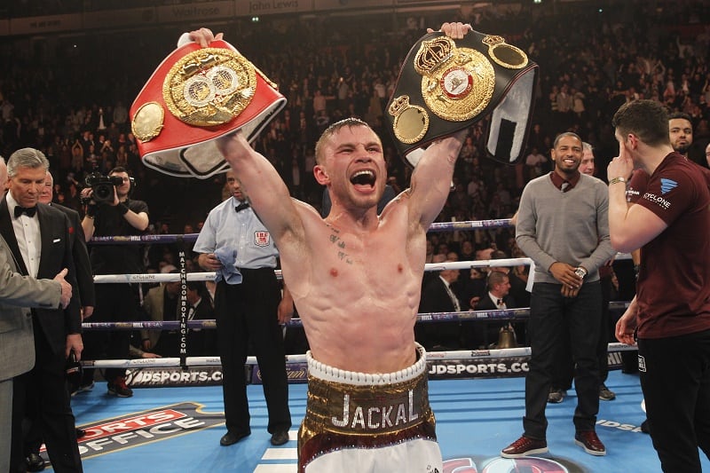 Carl Frampton with his unified titles